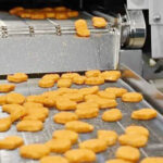 chicken nuggets making machine works in factory